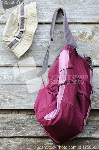Image of Khaki Hat and Purple Backpack