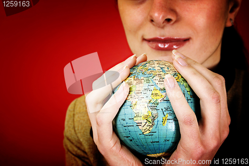 Image of Globe in a girl's hands