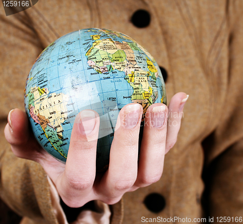 Image of Globe in a girl's hands