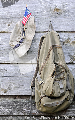 Image of Khaki Hat, Backpack and US Flag