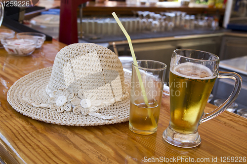 Image of Sun hat and cold druinks