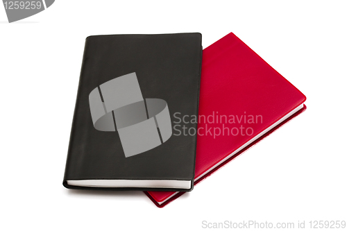 Image of Red and black notebooks