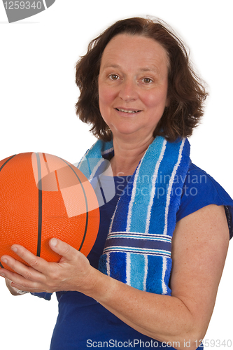 Image of Middle aged woman with basketball 