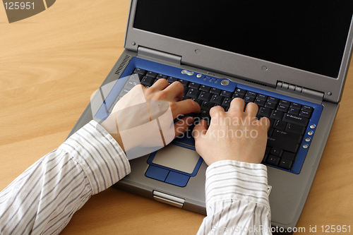 Image of Businessman with laptop