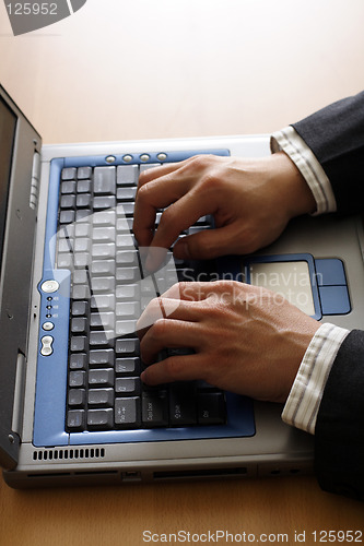 Image of Businessman and laptop