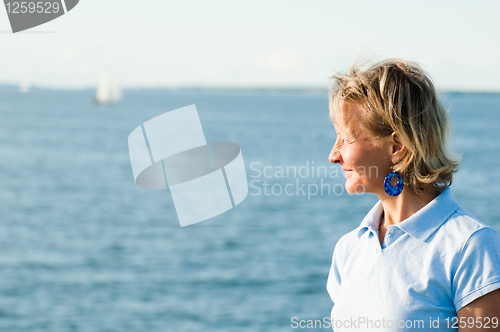Image of The woman on a background of the sea