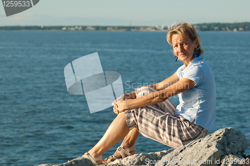 Image of The woman on a background of the sea