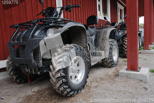 Image of two ATVs outdoor 