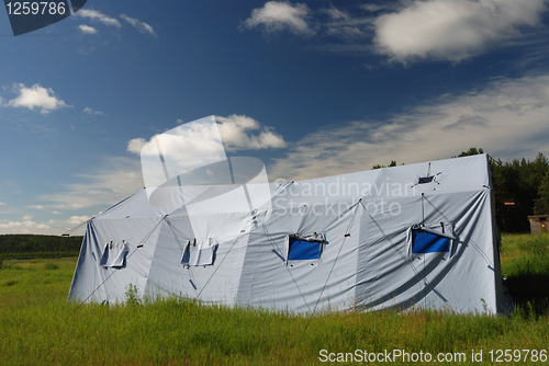 Image of large tent in the meadow