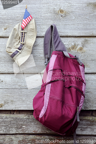 Image of Khaki Hat, US flag and Magenta Backpack