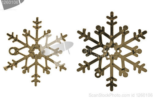 Image of Two plastic gold color snowflake