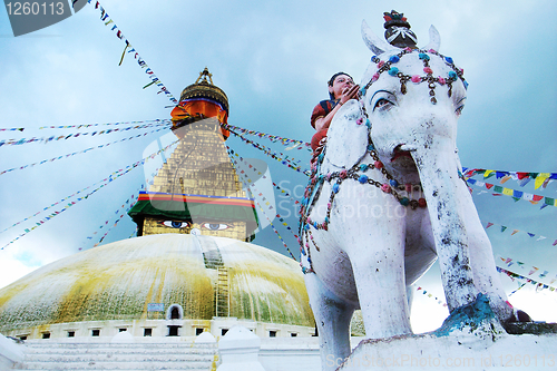 Image of Boudhanath Stupa and prayer flags in Kathmandu, Nepal