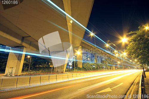 Image of Traffic through the city (traffic seen as trails of light) 