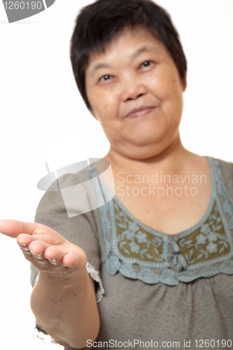 Image of Young Asian woman hand showing blank sign 