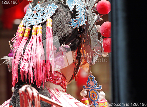 Image of chinese dummy opera, looking after the stage