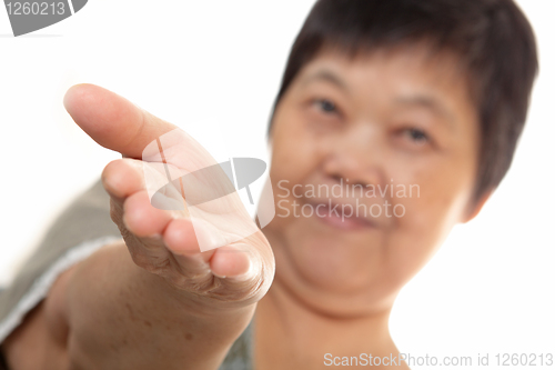 Image of Young Asian woman hand showing blank sign 