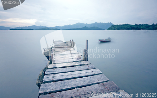 Image of old jetty walkway pier the the lake 