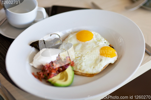 Image of sunny side up eggs on a plate