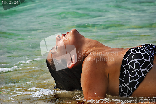 Image of Beautiful woman in the sea