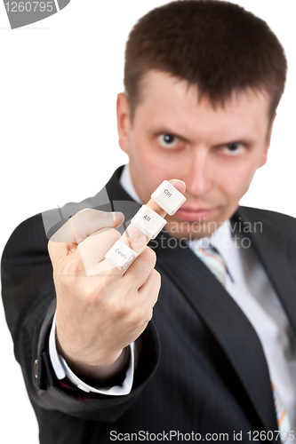 Image of businessman shows Fuck. On the finger keys Ctrl Alt Del