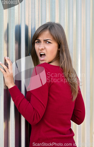 Image of Beautiful girl in a purple dress