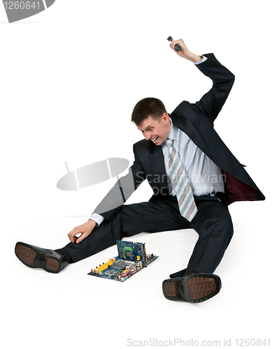 Image of businessman with a hammer