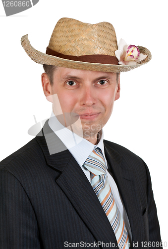 Image of Handsome businessman with a straw hat