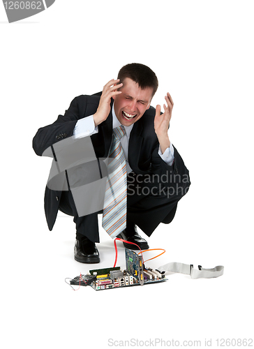 Image of businessman is crying