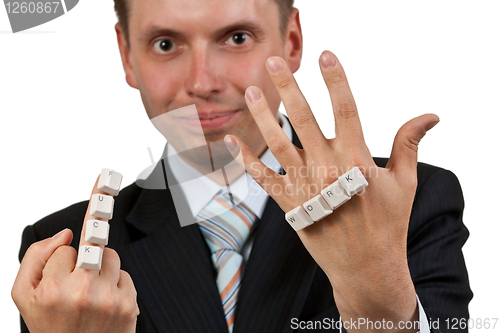 Image of FUCK WORK inscription and of the keys in the hands