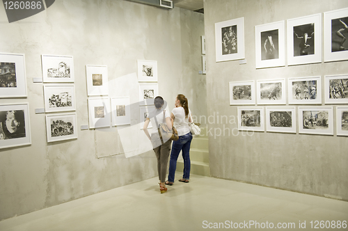 Image of Two woman on photo exhibition