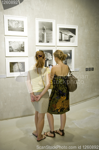 Image of Two woman on photo exhibition