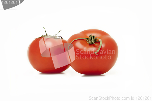 Image of two red tomatoes on white background