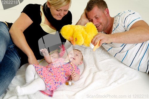 Image of Happy family playing