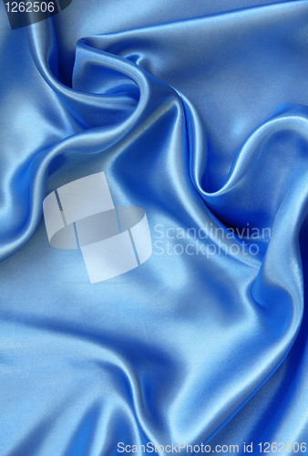 Image of Smooth elegant blue silk as background 