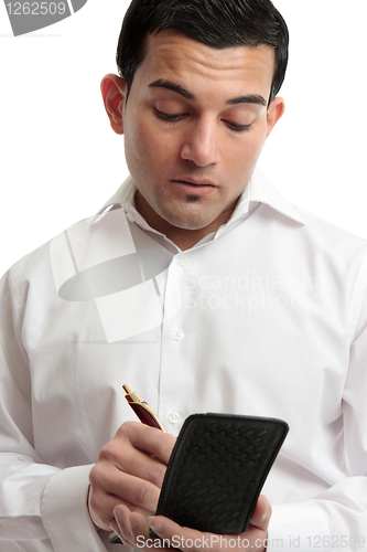 Image of Man or waiter writing notes