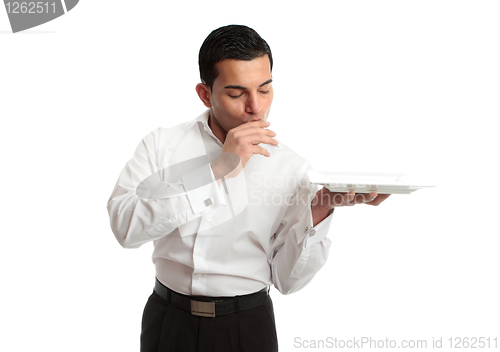 Image of Delighted waiter holding plate