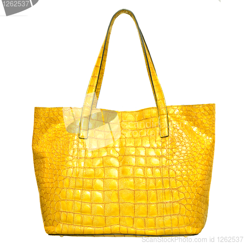 Image of luxury yellow leather female bag isolated on white