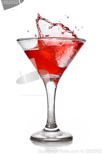 Image of Red cocktail with splash isolated on white