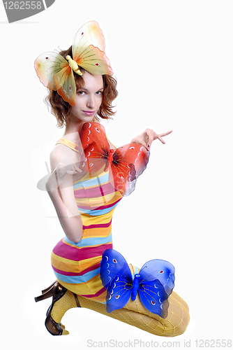 Image of sitting girl with color butterflies isolated on a white