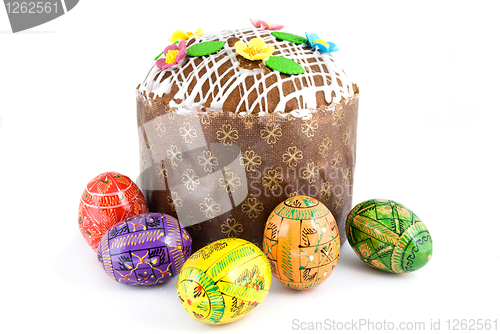 Image of easter eggs and cake isolated on white