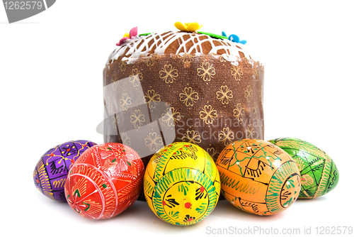 Image of easter eggs and cake isolated on white