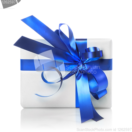 Image of Holiday gift with blue ribbon isolated on white