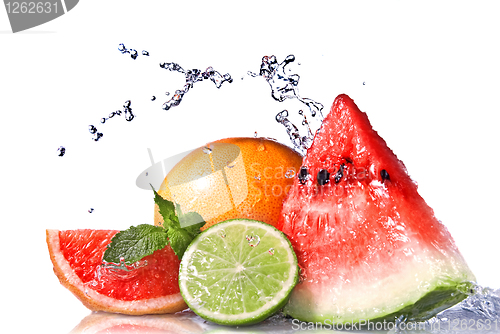 Image of Water splash on fresh fruits isolated on white