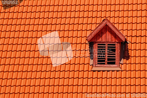 Image of orange roof with window