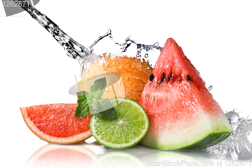 Image of Water splash on fresh fruits isolated on white