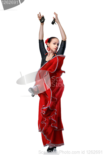 Image of young woman dancing flamenco with castanets isolated on white