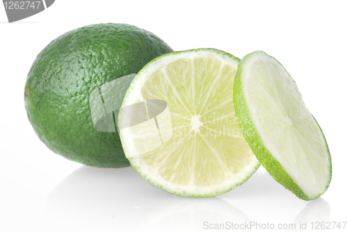 Image of Green lime with slices on white