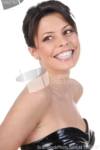 Image of Beautiful smiling brunette in black dress isolated on white