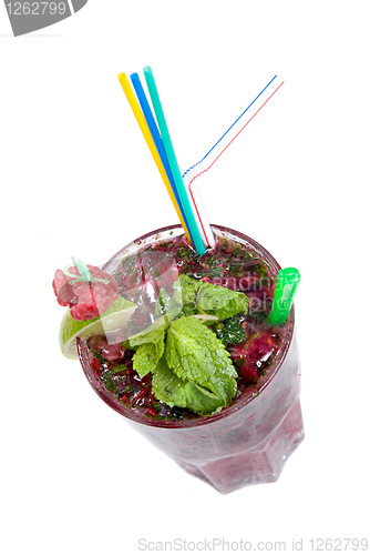 Image of Energy mohito with mint, lime and raspberry isolated on white