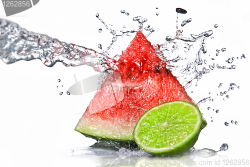 Image of watermelon, lime and water splash isolated on white